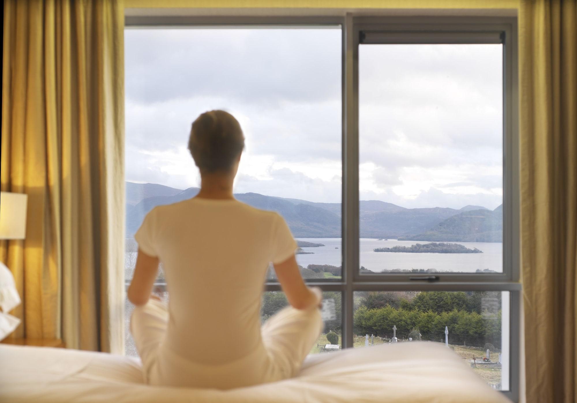 Aghadoe Heights Hotel & Spa Killarney Exterior foto A woman meditating